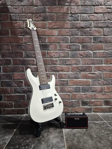 Электрогитара USA Schecter Demon 8 WH + Моделирующий Комбик Nux Air (комплект)